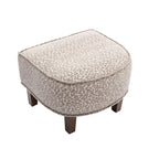 Poltrona a botte imbottita con pouf