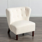 Poltrona senza braccioli in tessuto Sherpa con gambe in legno