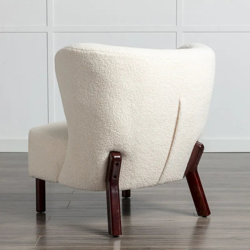 Poltrona senza braccioli in tessuto Sherpa con gambe in legno